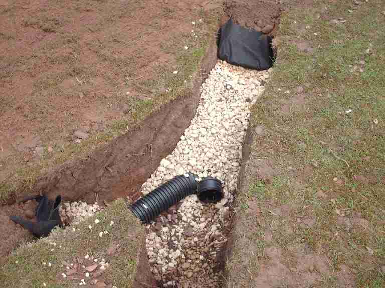 Image of a French drain under construction.