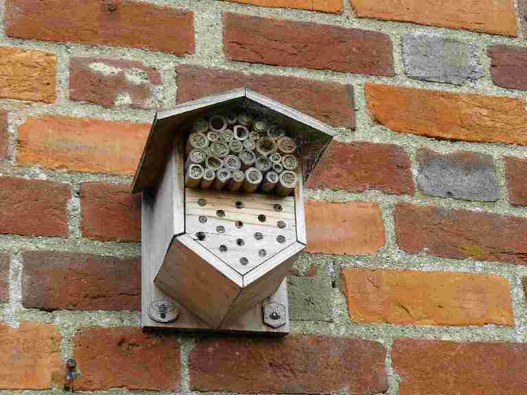 Image of a mortar bee house.