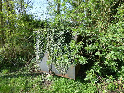 Image of an old rusty oil storage tank.